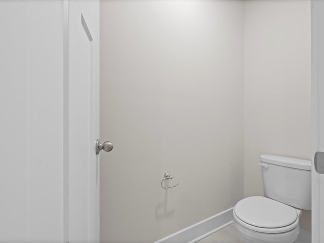 bathroom featuring toilet