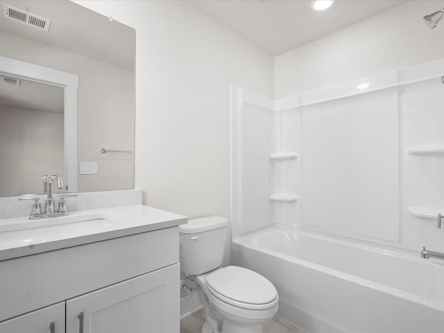 full bathroom with shower / tub combination, vanity, and toilet