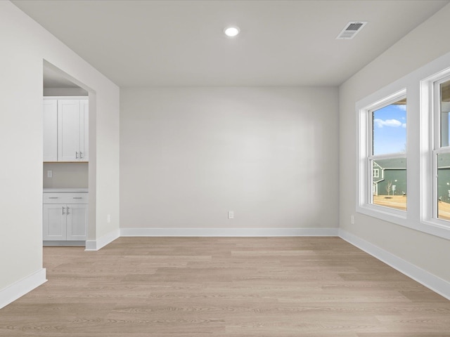 empty room featuring light hardwood / wood-style floors