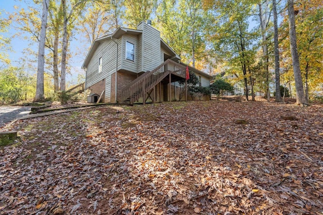 view of home's exterior with a deck