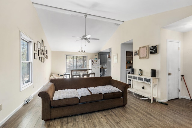 living room featuring hardwood / wood-style floors, vaulted ceiling with beams, plenty of natural light, and ceiling fan