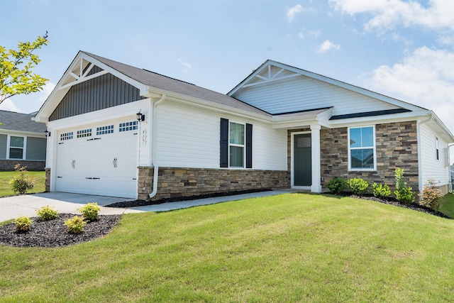 view of front of property featuring a front lawn and a garage