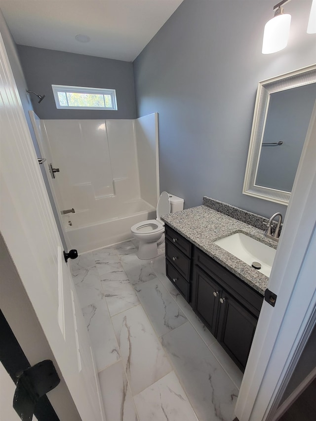 full bathroom with vanity, toilet, and bathtub / shower combination