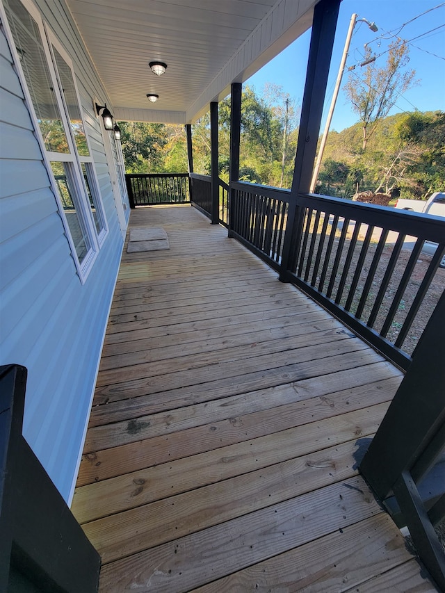 wooden deck with a porch