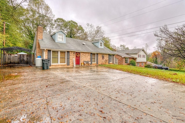 new england style home with a carport