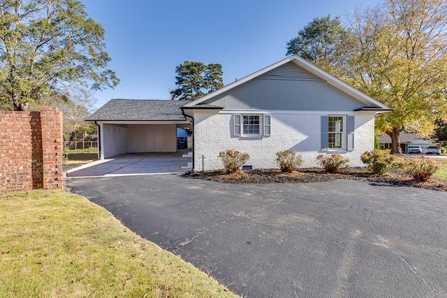 view of front of house with a carport