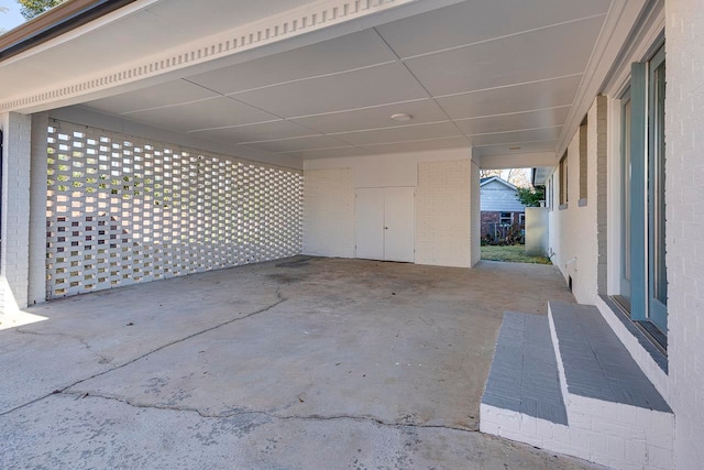 exterior space with a carport