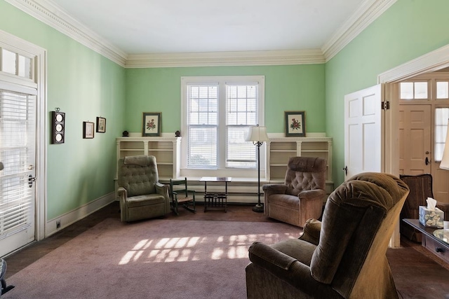 sitting room featuring dark carpet and crown molding