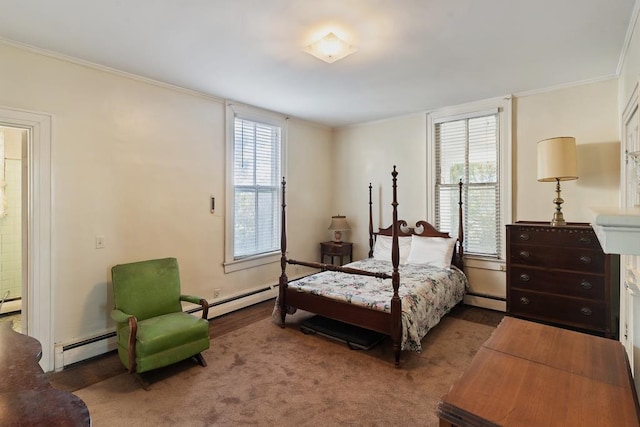 bedroom featuring baseboard heating and ornamental molding