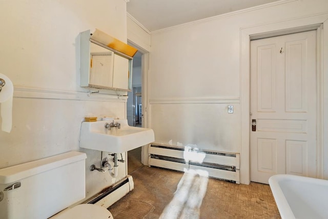 bathroom featuring crown molding, sink, a baseboard radiator, and toilet