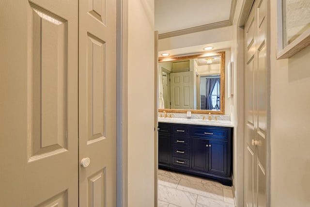 bathroom featuring vanity and crown molding