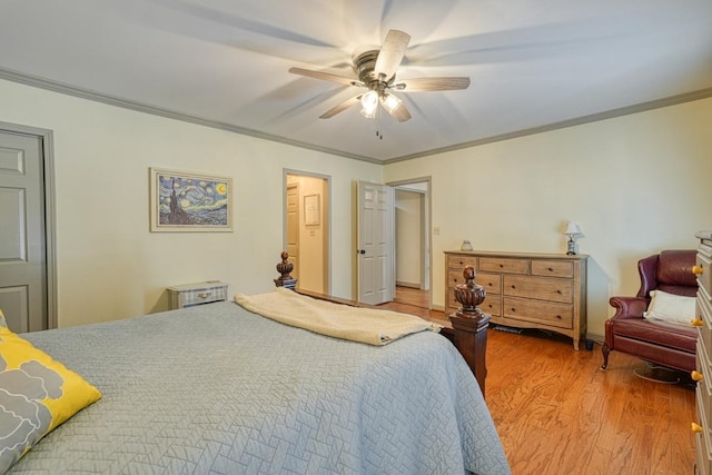 bedroom featuring wood-type flooring, ceiling fan, and ornamental molding