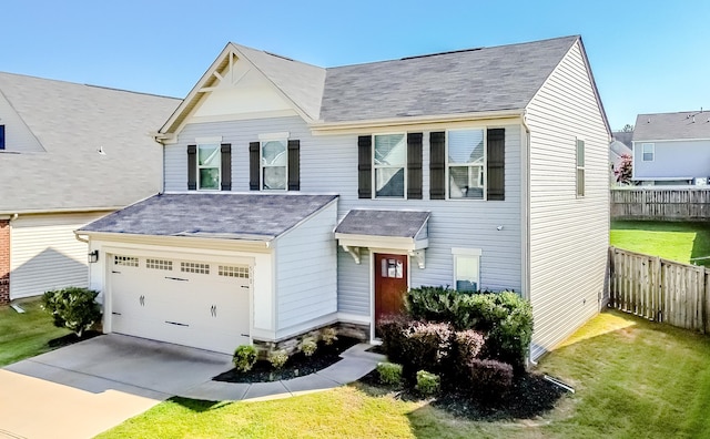 view of front facade featuring a garage and a front yard