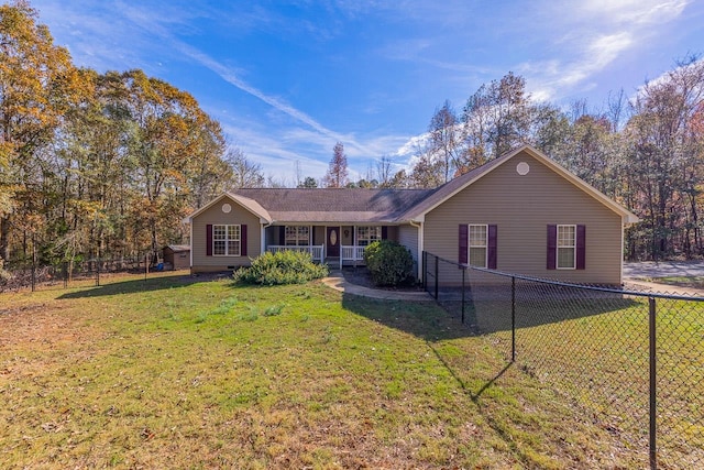 ranch-style home with a front yard and covered porch