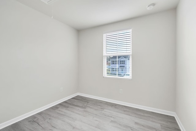 empty room featuring light hardwood / wood-style floors