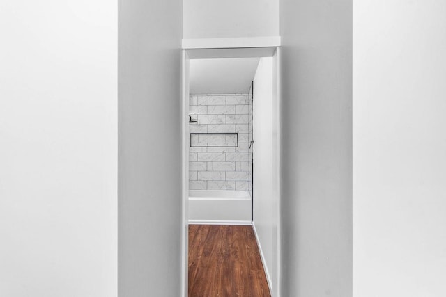 hallway featuring wood-type flooring