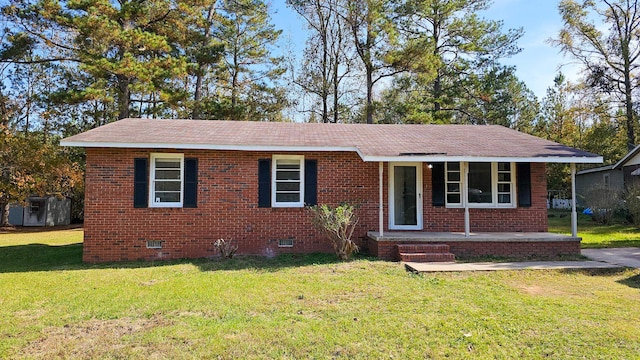 single story home with a porch and a front lawn