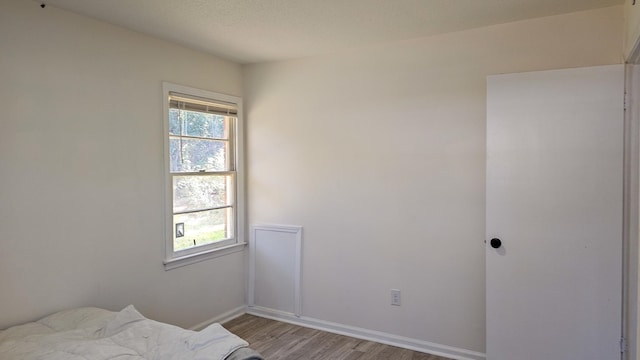 bedroom featuring light hardwood / wood-style floors