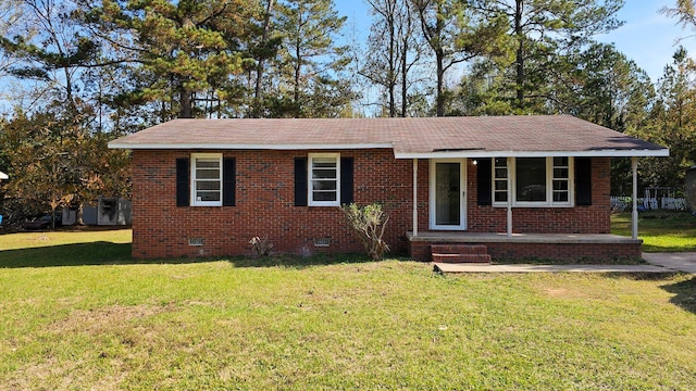 single story home featuring a front yard