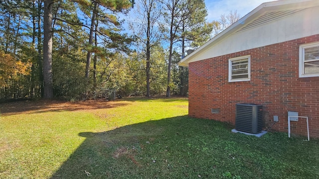 view of yard featuring central AC