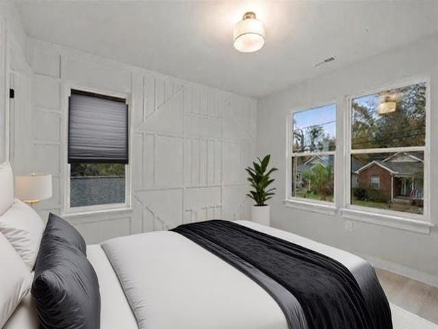 bedroom featuring wood-type flooring