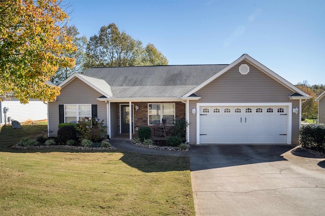 ranch-style house featuring a front yard and a garage