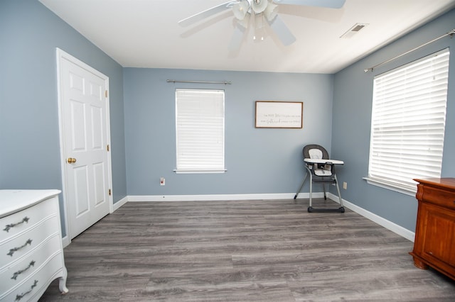 interior space featuring hardwood / wood-style floors and ceiling fan