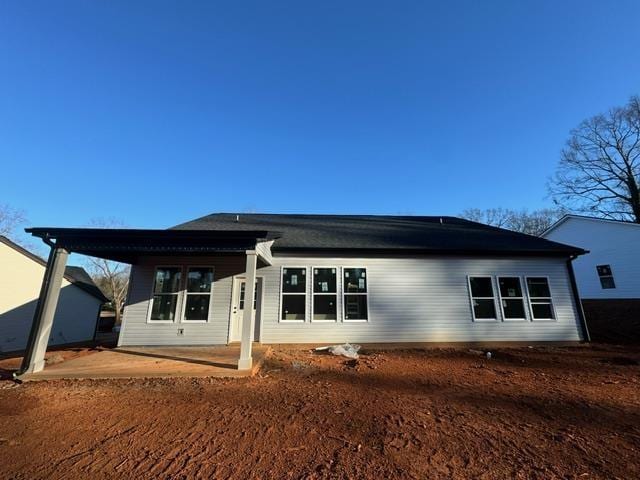 rear view of house with a patio area