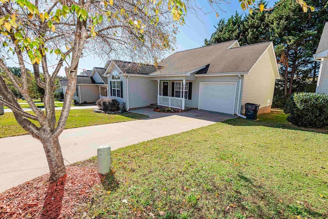 view of front of house with a front lawn and a garage