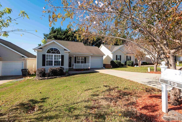 ranch-style home featuring a front yard and a garage