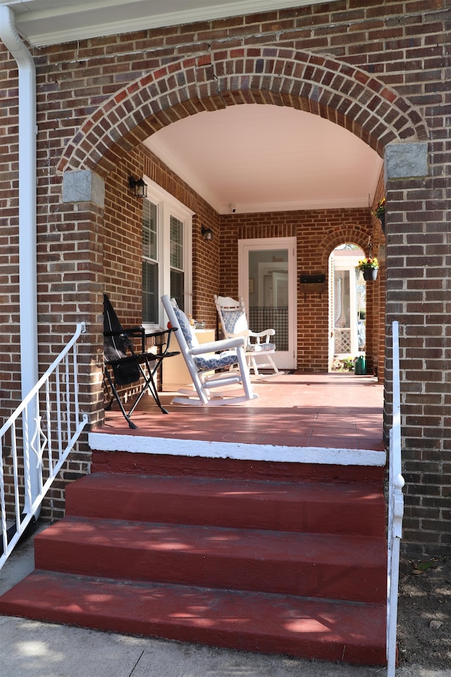 wooden terrace with a porch