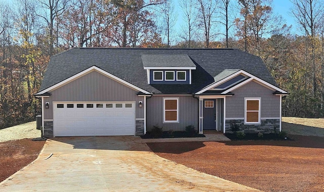 craftsman inspired home featuring a garage