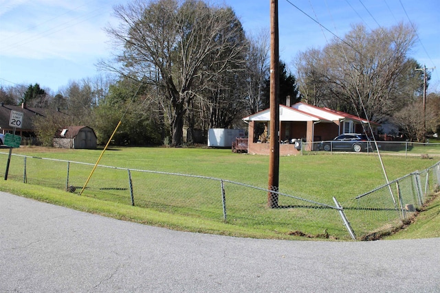 view of yard with a storage shed