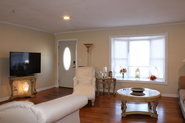 living room with dark hardwood / wood-style flooring and crown molding