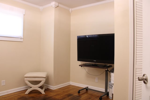 interior space featuring wood-type flooring and ornamental molding