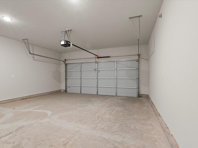 garage featuring a garage door opener