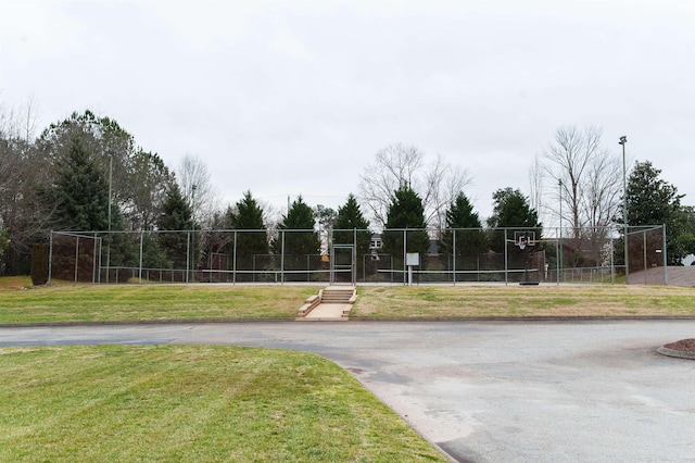 view of home's community with a yard