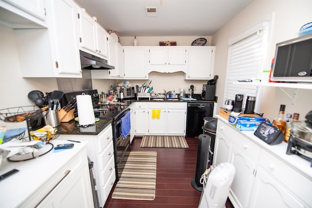 kitchen featuring sink, black appliances, dark hardwood / wood-style floors, and white cabinets