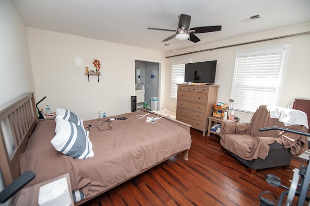 bedroom featuring dark wood-type flooring and ceiling fan