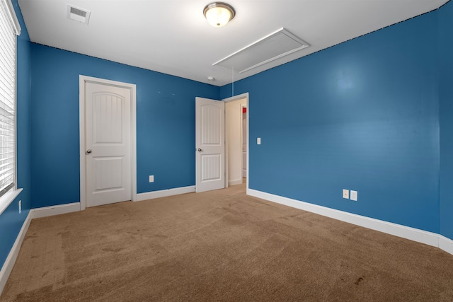 view of carpeted spare room