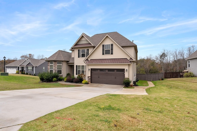 craftsman-style house with a front yard and a garage