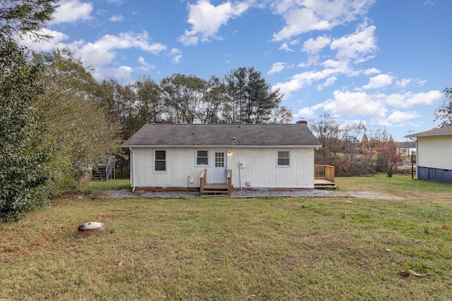 back of house with a deck, crawl space, a lawn, and a chimney