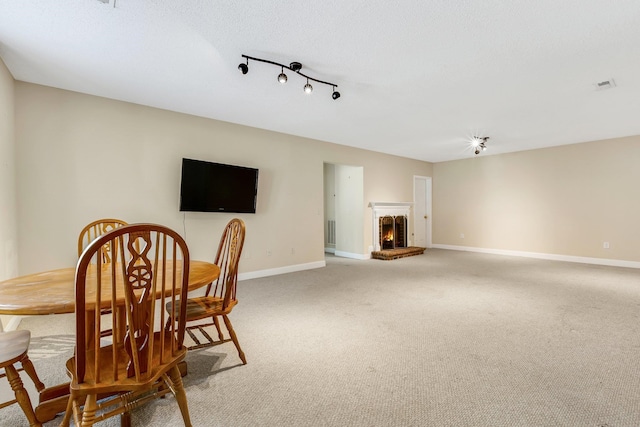 view of carpeted dining space