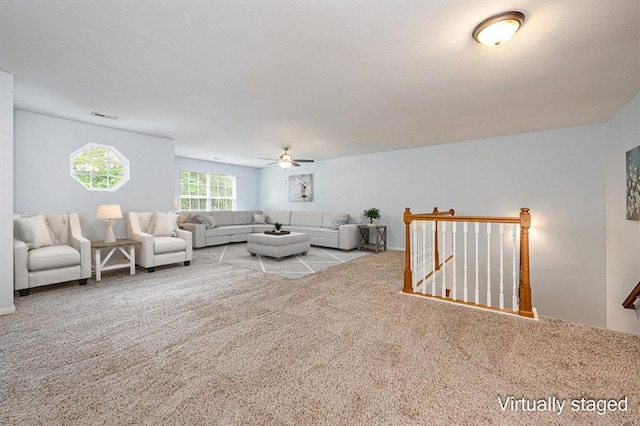 living room featuring light carpet