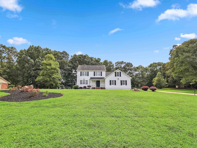 view of front of house with a front lawn