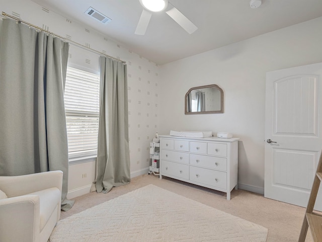 carpeted bedroom featuring ceiling fan