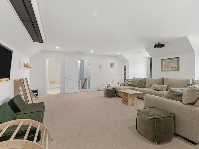 living room with light colored carpet and lofted ceiling