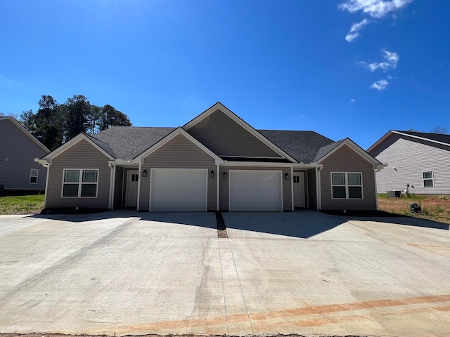 single story home with a garage