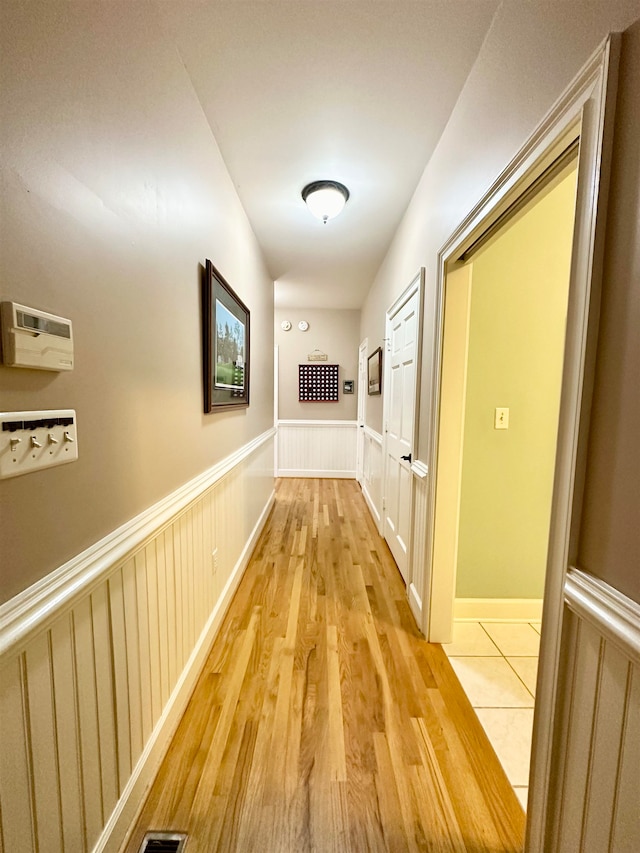 hall featuring light hardwood / wood-style floors