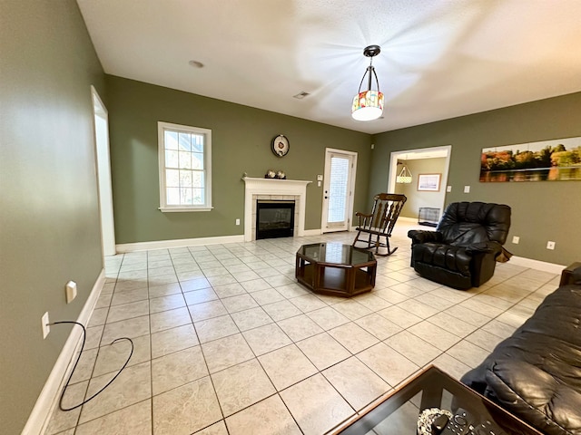 tiled living room with a fireplace